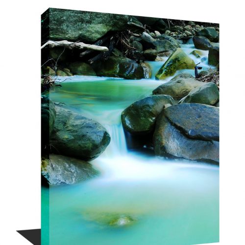A stunning photo museum quality canvas gallery wrap of a teal green creek.