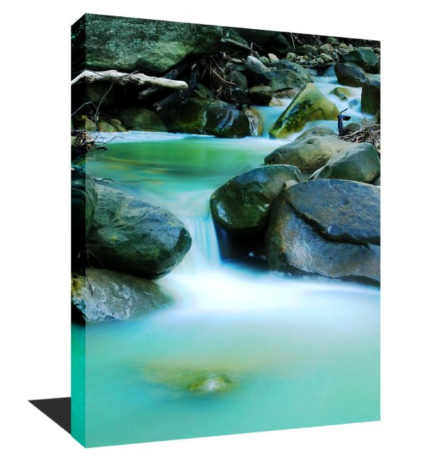 A stunning photo museum quality canvas gallery wrap of a teal green creek.