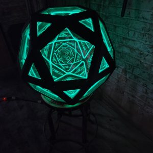 Illuminated geometric LED art sculpture by Chris Knight Creations, innovative custom lighting design.