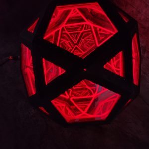 Vivid LED geometric art sculpture with red lighting, modern and abstract decorative piece.