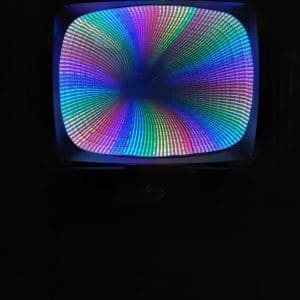 Colorful LED digital display with vibrant rainbow patterns for modern tech aesthetics.