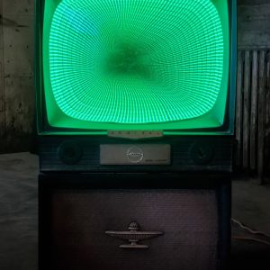 Vintage green neon TV with swirling tunnel display, modern retro-inspired custom design, perfect for vintage decor and art installations.