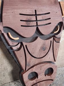 Rustic wooden wall art with cutout design, handcrafted by Chris Knight Creations.