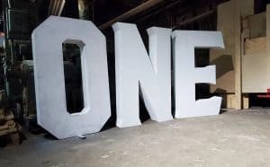 Large white 3D LOVE sign for wedding or event decor by Chris Knight Creations.
