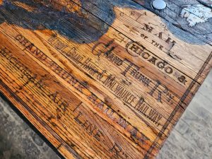 Vintage wooden crate with stamped branding and distressed finish, showcasing expert craftsmanship.