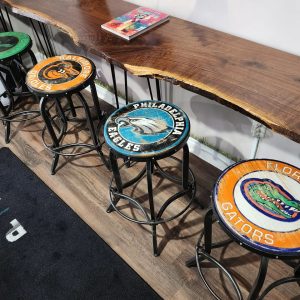 Handcrafted sports team logo bar stools featuring Eagles, Gators, and Salemide NFL NFL logos.