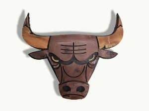 Handcrafted wooden bull head wall art for rustic home decor and western-style interior design.