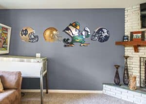 Decorative football helmets wall art featuring Notre Dame, college football, and a colorful mascot Artwork.